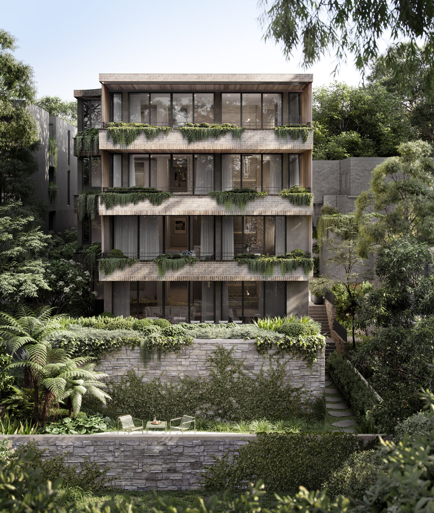 Rear facade of the building framed by mature trees, with brick balconies, hanging greenery, and a sandstone-walled garden terrace.