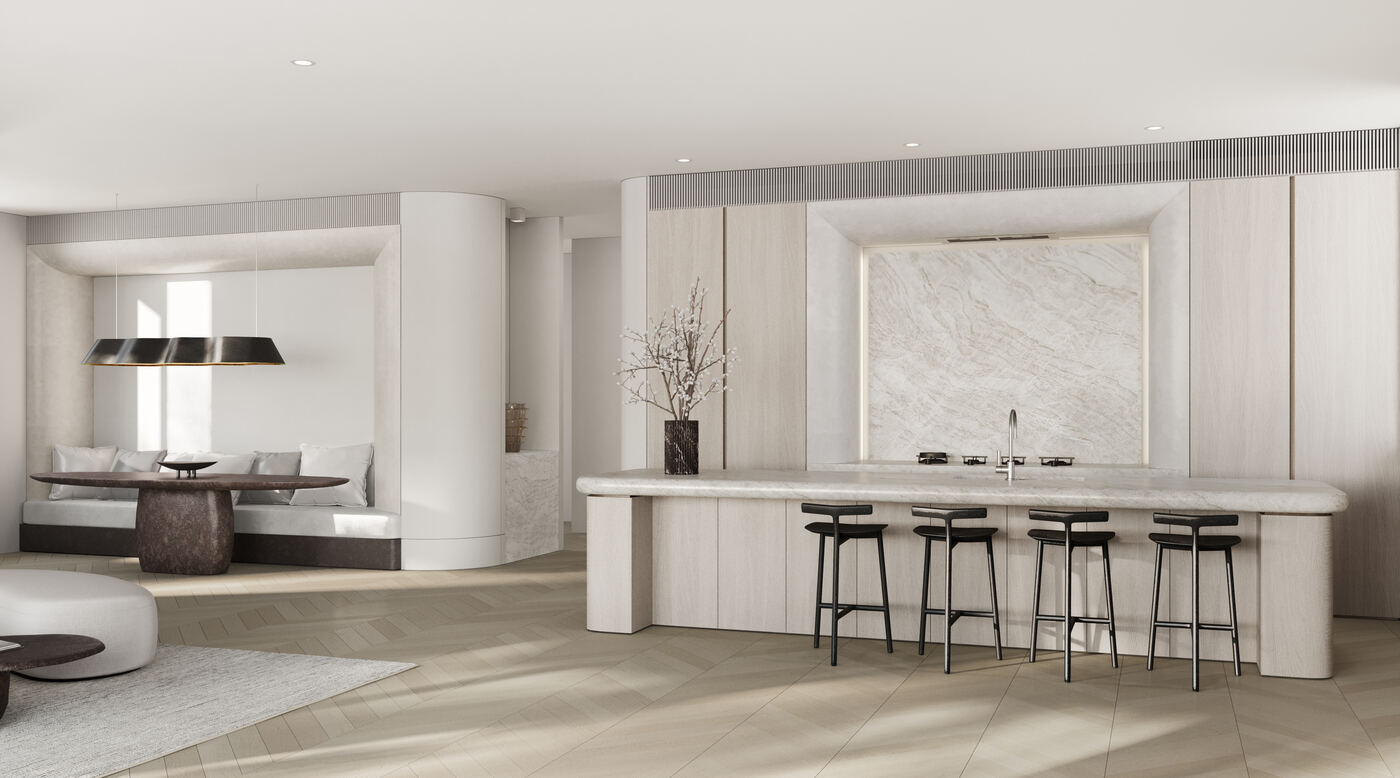 Kitchen and informal dining nook with a long stone island, timber cabinetry, a book-matched stone splashback, and a curved banquette seat.